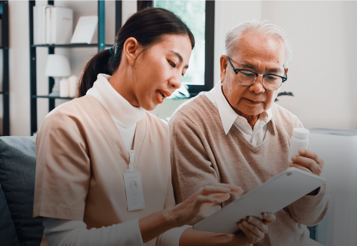 Woman providing more information to patient. 
